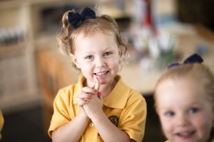 early learning student smiling